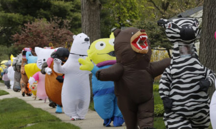 Detroit-Area Residents Lift Spirits With Costumed Parades