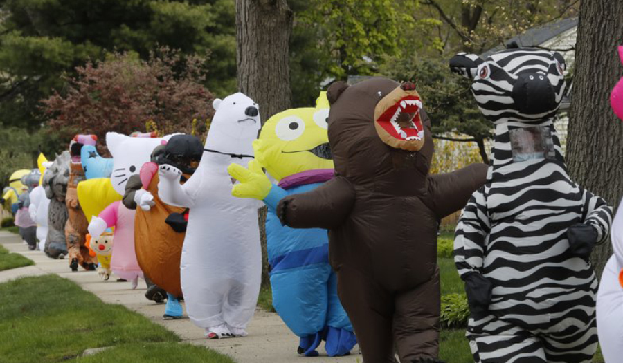 Detroit-Area Residents Lift Spirits With Costumed Parades