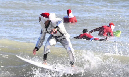 Frigid Weather Didn’t Stop Santas Surfing Off Florida Coast